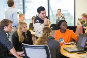 Computer science degree student in a classroom.